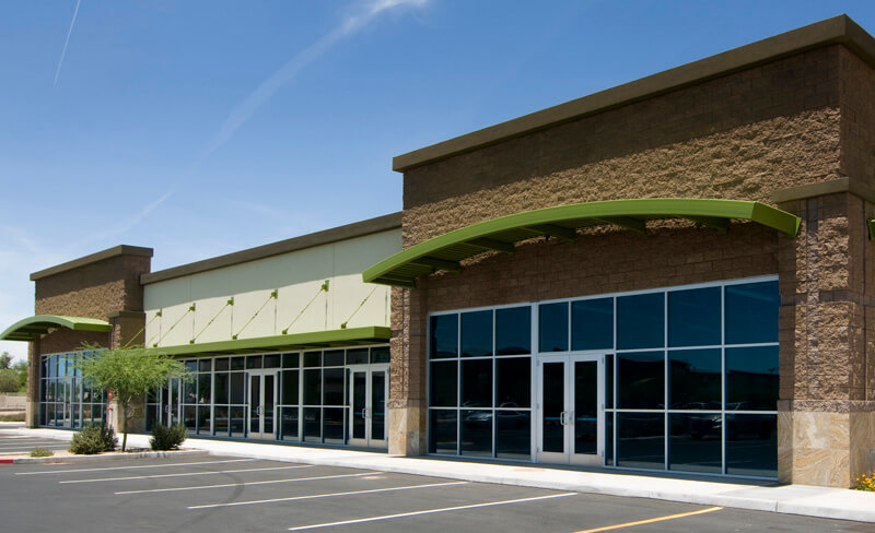 empty retail locations at a newly constructed strip mall