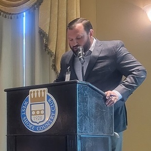 Jason Grace speaking at CRE Symposium