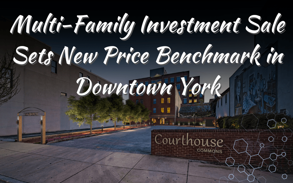 Courthouse Commons in Downtown York, PA at night, highlighting a record-breaking multi-family investment sale with modern urban development in the background.
