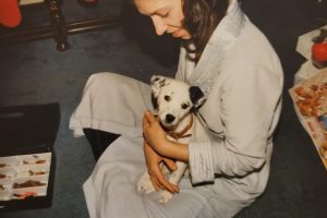 Lynn Brakefield holding a small dalmatian puppy